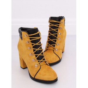 Originální dámská kotníková obuv žluté barvy na vysokém podpatku