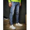 Moderní pánské džíny s dírami v modré barvě