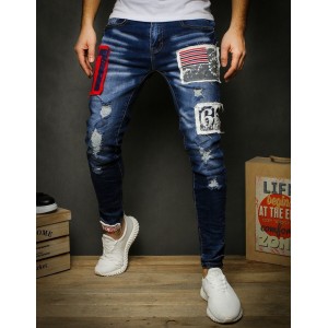 Moderní roztrhané pánské džíny s nášivkami